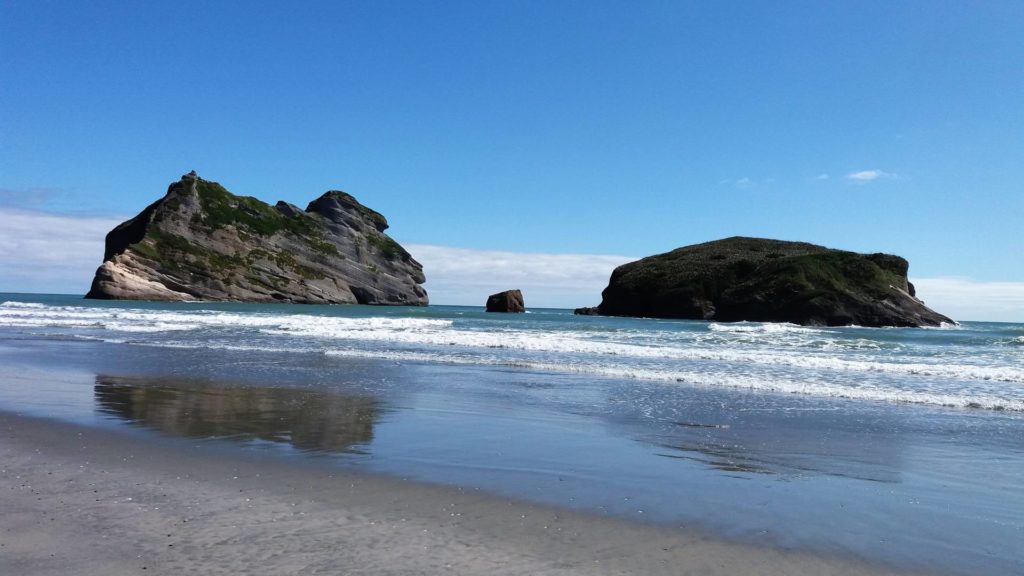 Rock formations off shore at Whakariki Beach