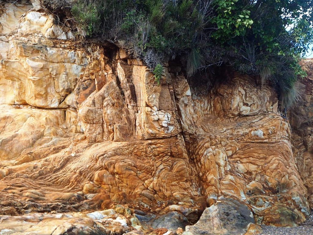 Interesting rock formation and patterns created on rocks along peninsula.