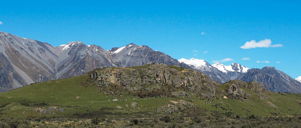 "Mt Sunday and Sinclair Range in background"